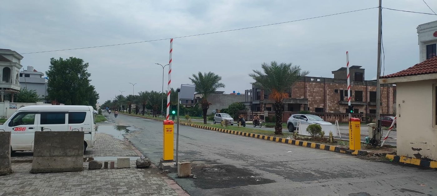 Traffic barrier installation at Khayaban-e-Amin community access road, Lahore