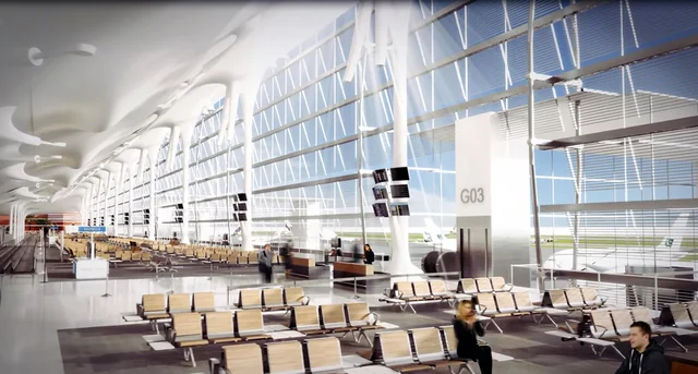 Airport departure lounge with a translucent roof and glazed façade letting in soft natural light