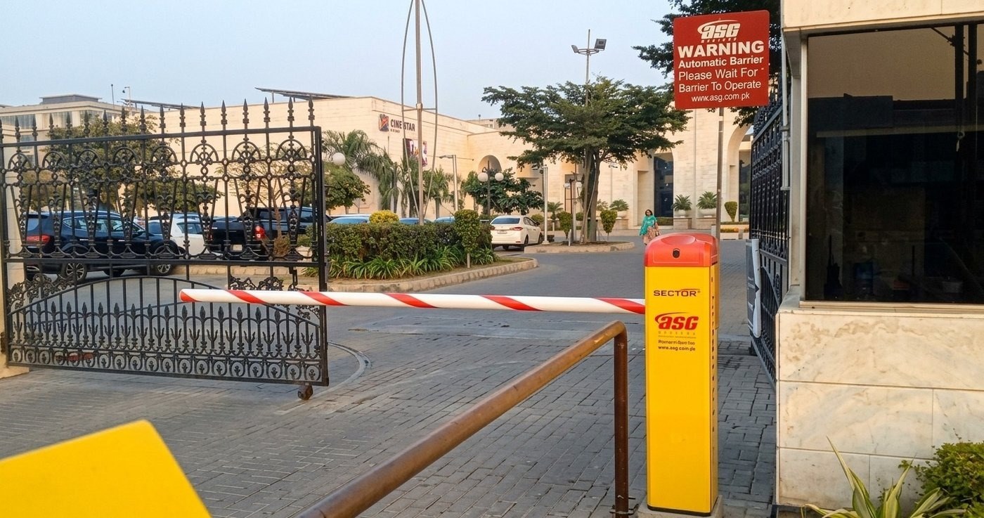 Automatic boom barrier at a secondary access gate, DHA Raya Golf & Country Club