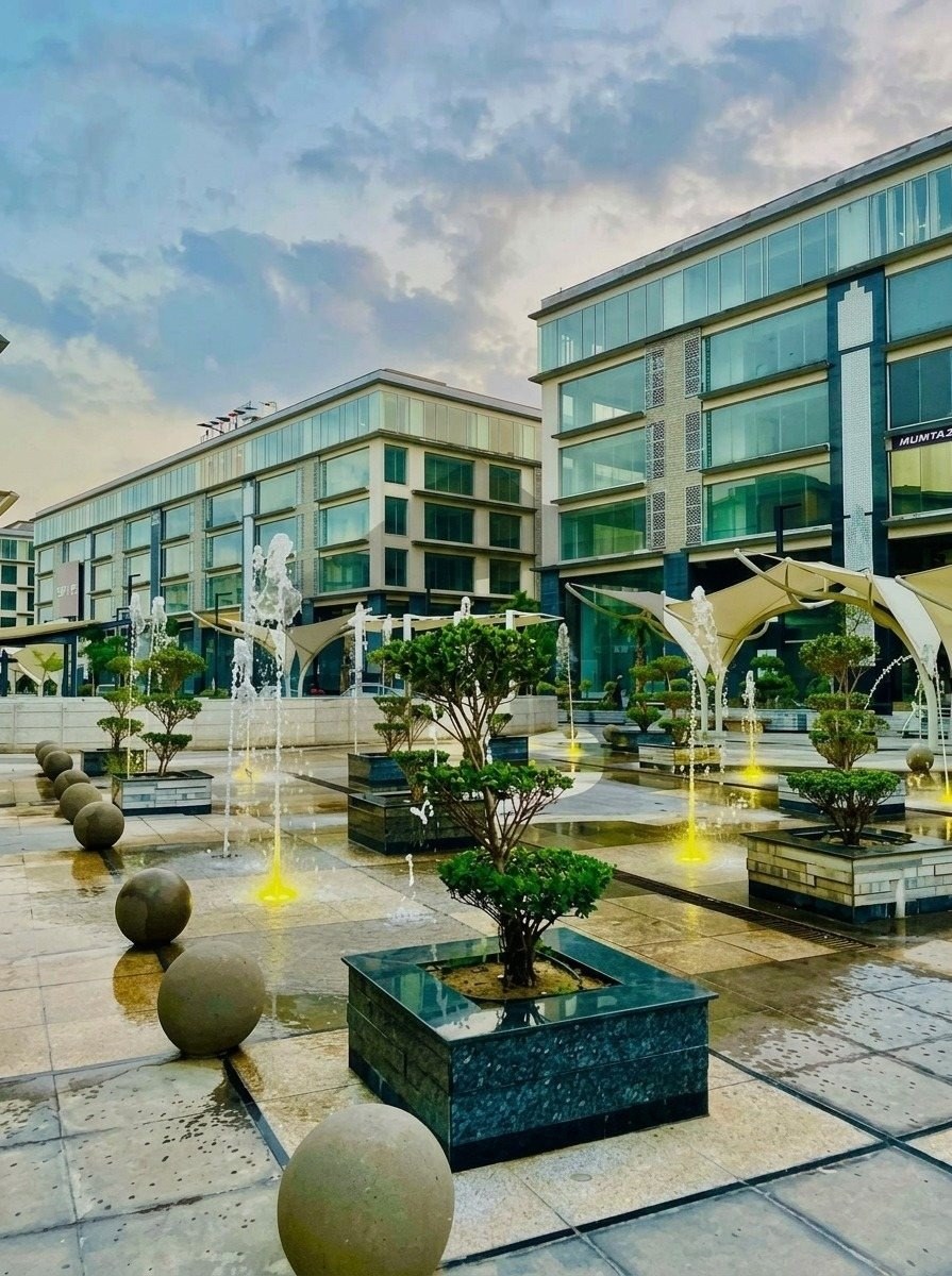 Exterior plaza view of the Raya Fairways commercial development