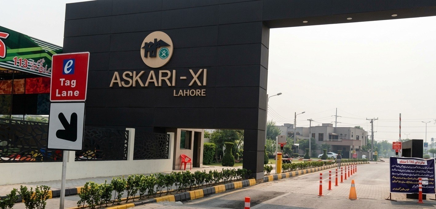 Main entrance signage of Askari-XI, Lahore, with E-Tag Lane sign