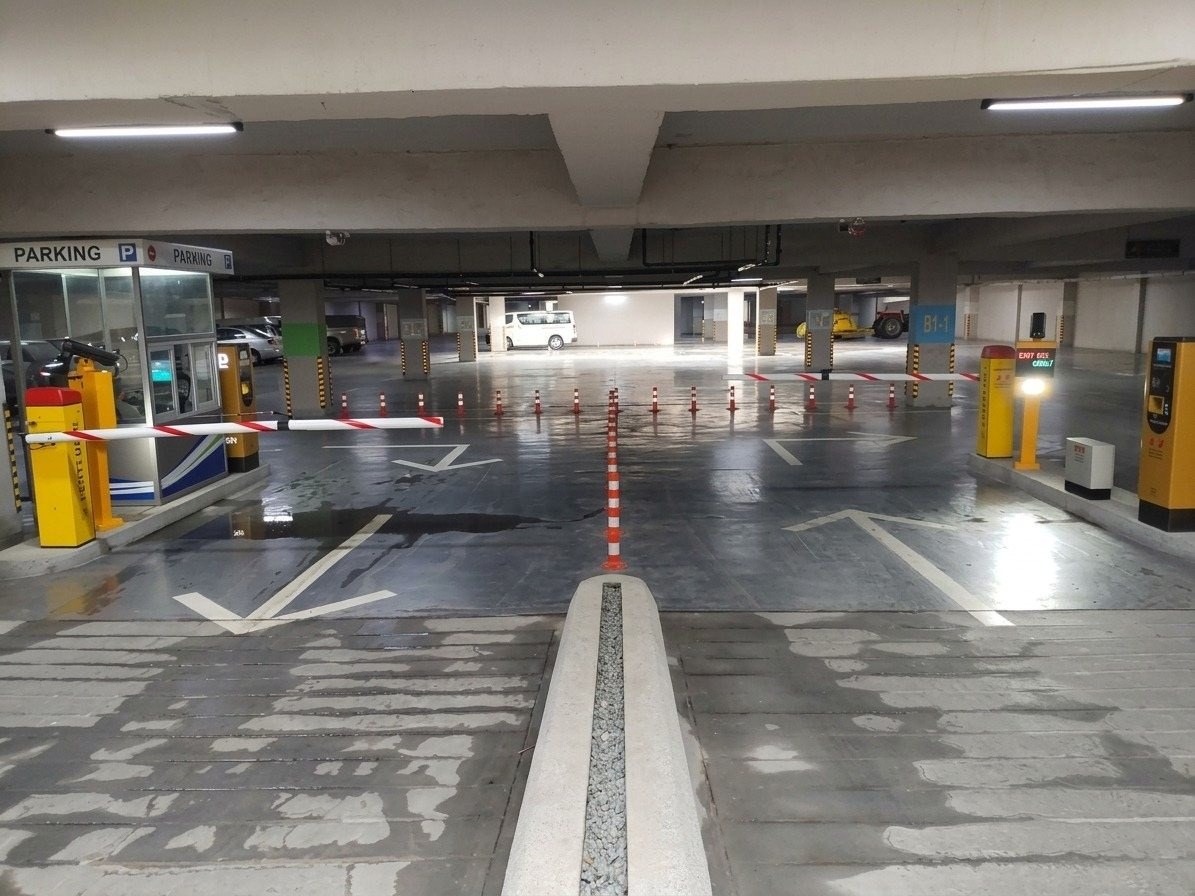 Parking entry barrier checkpoint booth at Raya Fairways basement parking